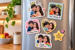 Doodle photo magnets of siblings on a fridge